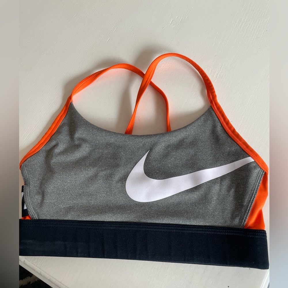 Nike gray orange and black sports bra